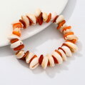 Náramek Shell Orange AT325